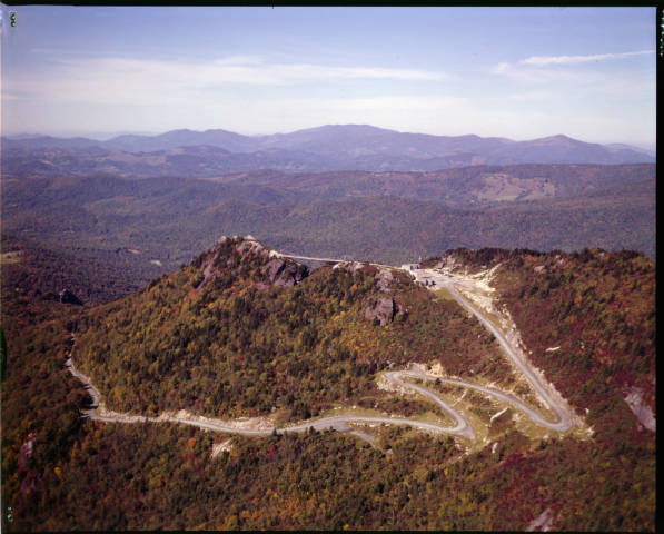 A winding mountain road to the summit. Aerial photo.