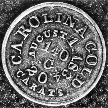 Enlargement of the obverse of a five-dollar gold coin believed to have been struck between 1834 and 1837 by Christopher Bechtler Sr. The actual diameter of the coin is 24.7 mm. North Carolina Collection, University of North Carolina at Chapel Hill Library.