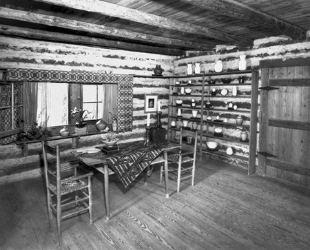The dining room in the home of Jacques and Juliana Busbee at Jugtown, showing pieces of their pottery. Courtesy of North Carolina Office of Archives and History, Raleigh.