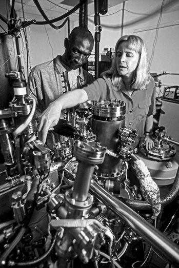 A doctoral student and faculty adviser look over equipment in the Physics Department's nanotribology laboratory. Photograph by Roger Winstead. Courtesy of North Carolina State University.