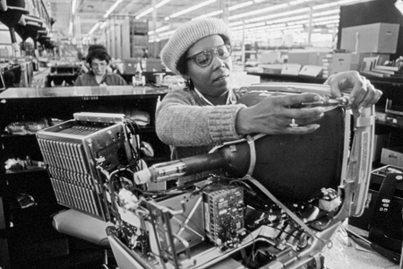 Computer under construction at an IBM production facility in Research Triangle Park, 1984. Photograph by Billy Barnes. North Carolina Collection, University of North Carolina at Chapel Hill Library.