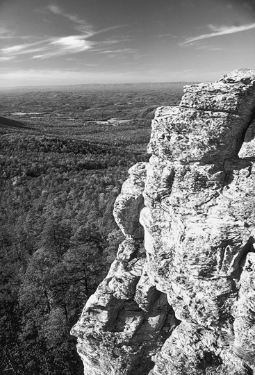 Rock formations tower above the surrounding landscape at Hanging Rock State Park in Stokes County. Photograph courtesy of North Carolina Division of Tourism, Film, and Sports Development.