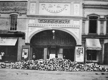 The results of a tin can drive in front of the Crescent Theater in Statesville during World War I. North Carolina Collection, University of North Carolina at Chapel Hill Library.