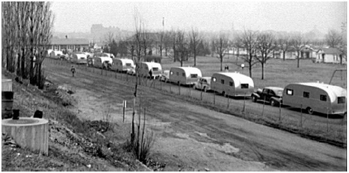 A caravan of fifty trailers— on its way to provide temporary housing in Wilmington—stops for the night outside Washington, D.C. Work in building ships and in other wartime industries brought lots of people from surrounding areas into North Carolina towns.