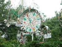 Photograph of whirligigs by Vollis Simpson in Vollis Simpson Park, Lucama in Wilson County, N.C. Image by the NC ECHO Project, North Carolina Department of Cultural Resources, taken August 18, 2002. Presented on NC Digital Collections.