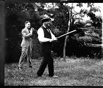 Josephus Daniels, Secretary of the Navy [right], playing baseball with son Frank. 1920.  From the National Photo Company Collection, Library of Congress Prints & Photographs Online Catalog. 