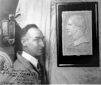 Photograph of a bust of Richard Henderson with the sculptor, George H. Honig, at left. Circa 1910-1930. Image from the North Carolina Museum of History. 