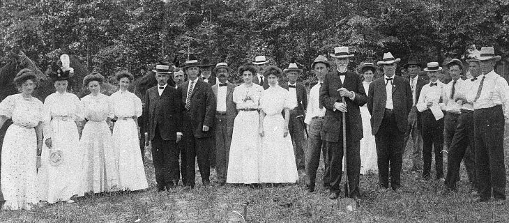  July 02 , 1907 | Identifier: 55-01-0004 Photograph of the groundbreaking ceremony for the East Carolina Teachers Training School. Thomas Jordan Jarvis is right of center with the shovel. Image from the University Archives, East Carolina University. 