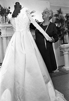 Willie Otey Kay finishing a debutante dress, Raleigh, N.C., September 4, 1974.  Item NO_9-4-1974_Fr20, from the <i>News & Obsever</i> collection at the State Archives of North Carolina.  Image copyrighted. For further use, please contact the <i>News & Observer</i>.