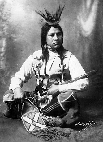 A studio portrait of Buffalo Child Long Lance taken in Regina, Saskatchewan, circa 1908. Image from Atlanta Journal-Constitution Photographic Archives at Georgia State University Library. 