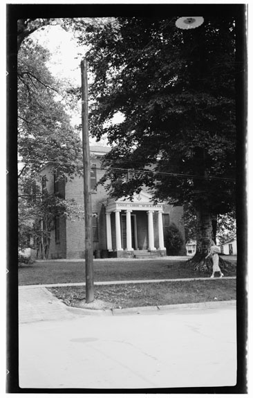 Black and white photograph of Eagle Lodge, 142 West King Street, Hillsborough, Orange County, N.C., by Archie A. Biggs, June 29, 1937. The Eagle Masonic Lodge was designed by William Nichols. From the Historic American Buildings Survey, Library of Congress Prints and Photographs Division. 