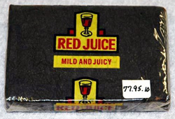 Photograph of a package of T. F. Williamson's Red Juice Chewing Tobacco.  Image courtesy of  the North Carolina Department of Cultural Resources Historic Sites.