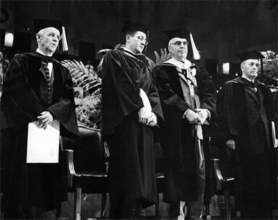 Group photograph of Frank Graham, William Friday, NC Governor Luther Hodges, and NC Supreme Court Chief Justice John Winborne (far right), 1957.  Item H.1970.78.83, from the collections of the North Carolina Museum of History.  