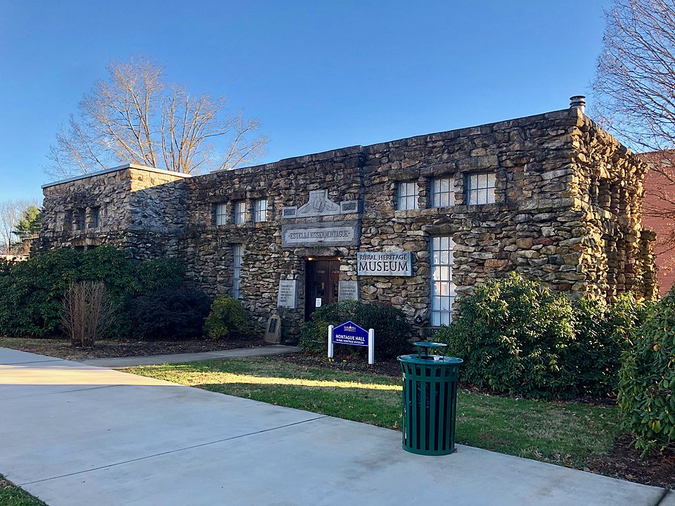 A stone building with a placard that reads "Rural Heritage Museum."
