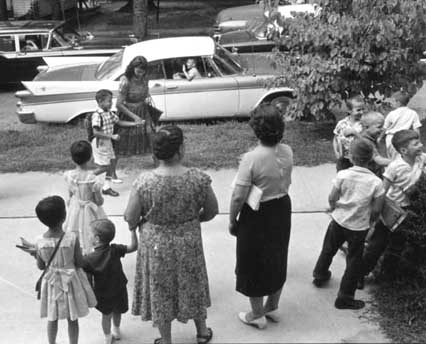 "Opening day for William Campbell, the first to integrate Raleigh City Schools, 1960. Courtesy of the News and Observer Negative Collection, North Carolina State Archives." Available online from the NC Museum of History. 