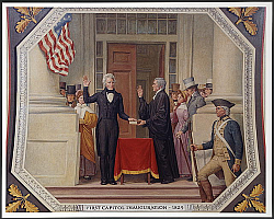 Andrew Jackson with John Marshall. They are in front of a building and other people are present. Jackson and Marshall are both pledging, with their hands raised and are both wearing suits.