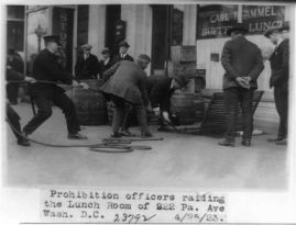 "Prohibition Officers Raiding the Lunchroom of 922 Pa. Ave, Wash. D.C.". 1923. Image courtesy of Library of Congress.