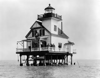 The Roanoke River lighthouse over water.
