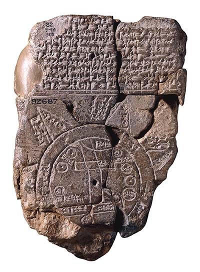 clay tablet with engraving and inscriptions on it