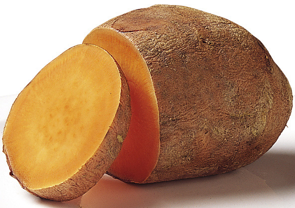Sweet potato with a slice cut from it.